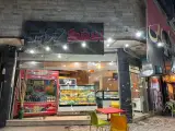 پیتزا ساندویچ اب میوه بستنی چوبی