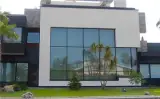 اجرای نمای کرتین وال و فریم لس ساختمان در خوزستان
