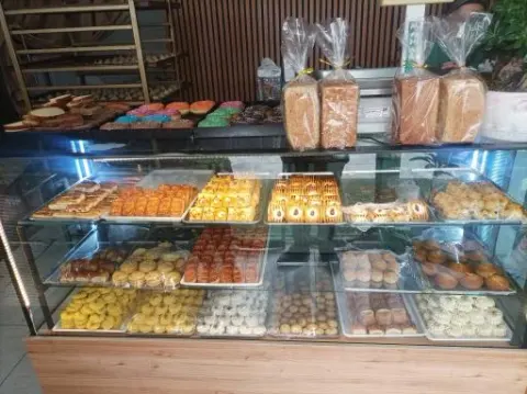 نان و شیرینی دیلا