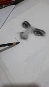 طراحی چهره سیاه قلم سوده