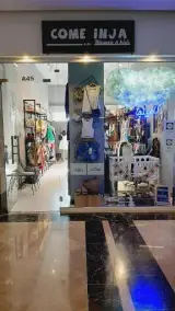 فروشگاه پوشاک کامینجا
