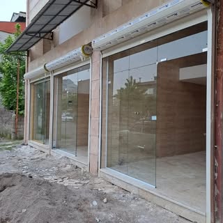 شیشه سکوریت و کرکره برقی رهنما