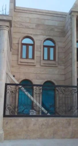 سنگ کاری و نمای ساختمان زارعی در مشهد